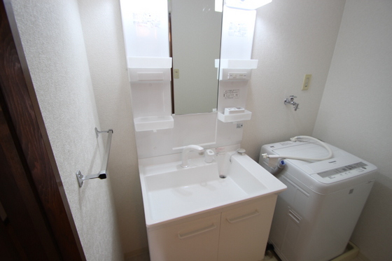 上幟こにしビル